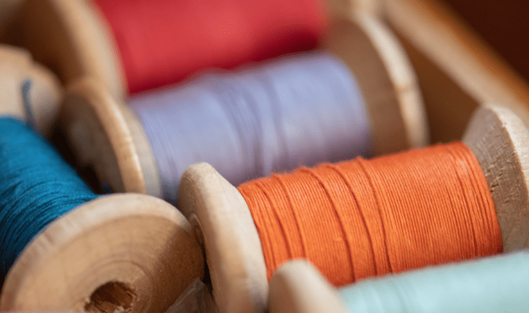5 spools of colorful thread